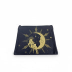 The Witches' Quest dark blue canvas makeup bag with a gold celestial goddess and crescent moon print and zipper closure.