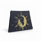 The Witches' Quest dark blue canvas makeup bag with a gold celestial goddess, moon, and star print.