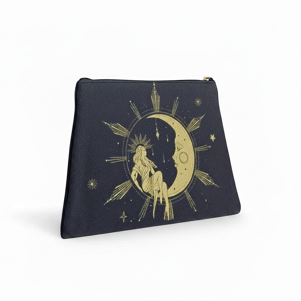 The Witches' Quest dark blue canvas makeup bag with a gold celestial goddess, moon, and star print.