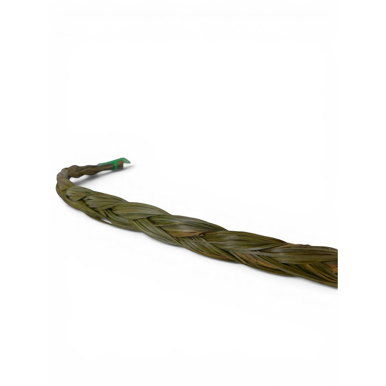 The Witches' Quest braided sweetgrass smudge stick for ritual cleansing and protection with natural green fibers.