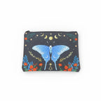 The Witches' Quest black canvas clutch featuring a blue butterfly, celestial moon, star, and floral print.