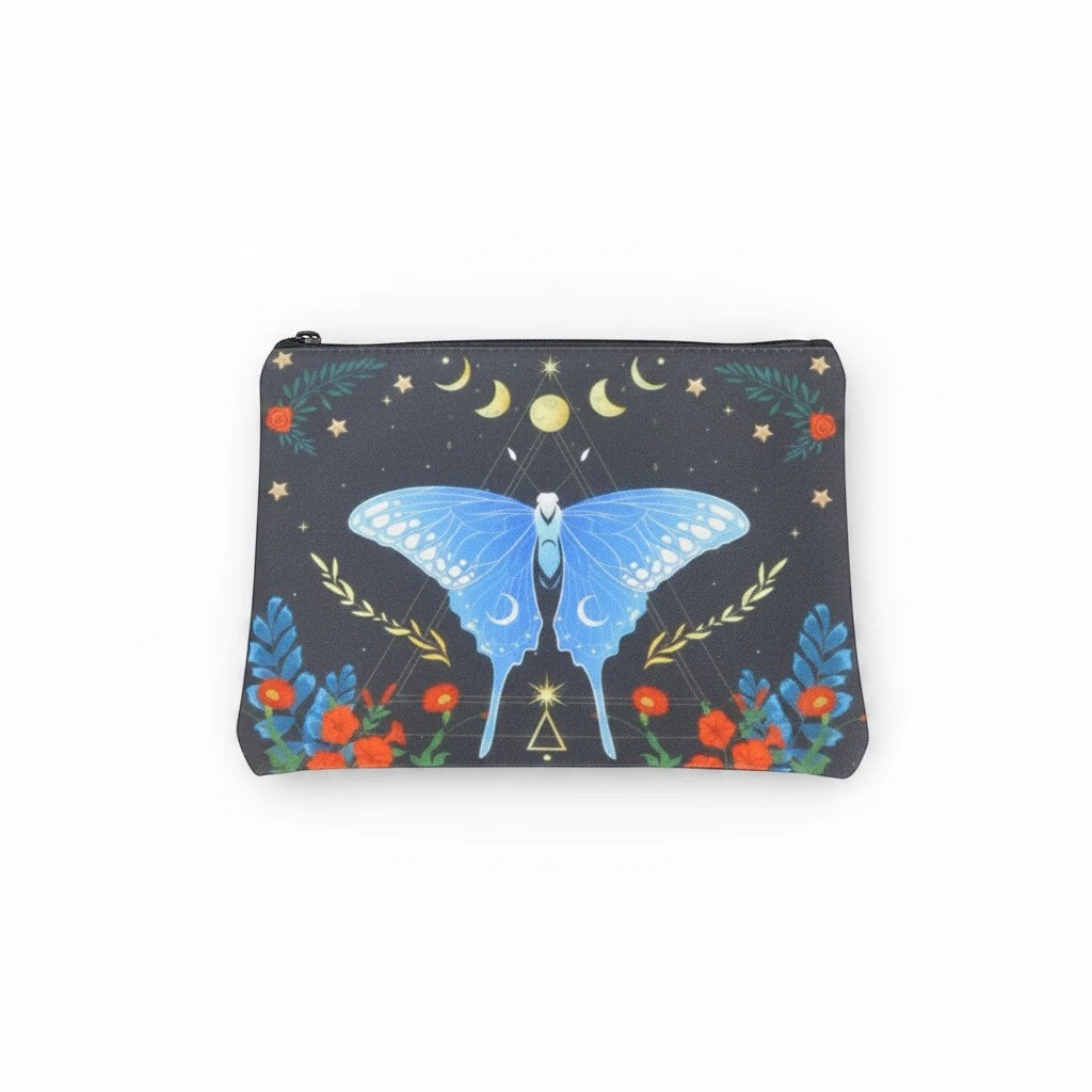 The Witches' Quest black canvas clutch featuring a blue butterfly, celestial moon, star, and floral print.
