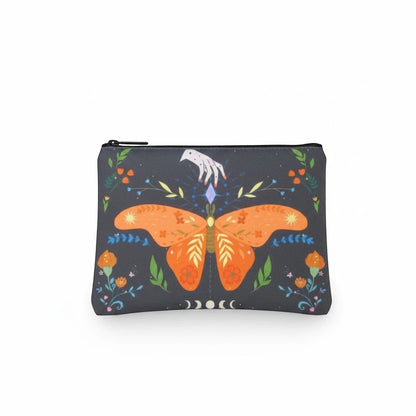 The Witches' Quest small canvas zip pouch featuring a mystical orange butterfly, celestial moons, and floral motifs.