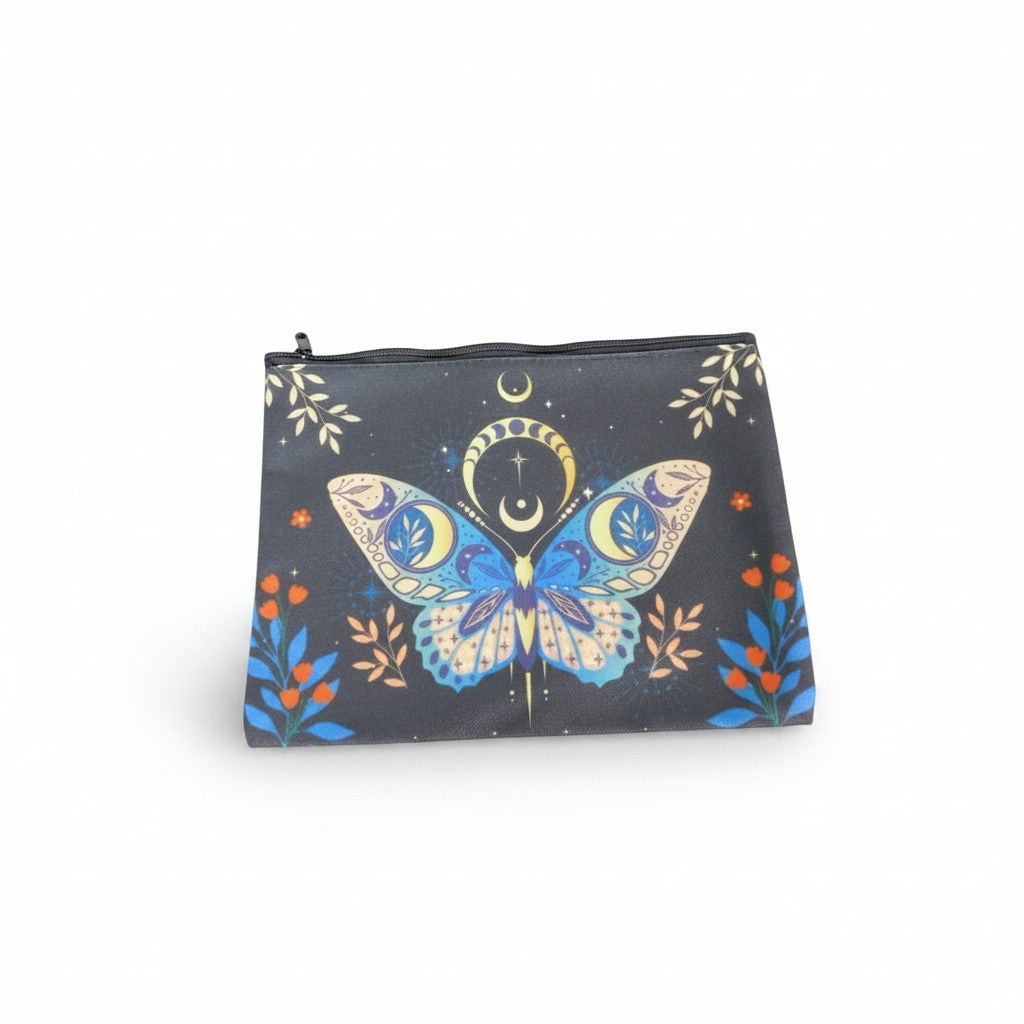 The Witches' Quest small black zip clutch featuring a celestial butterfly, moon, and star print in blue and gold.