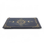 The Witches' Quest zippered canvas pouch in dark grey with a gold celestial sun and moon design.