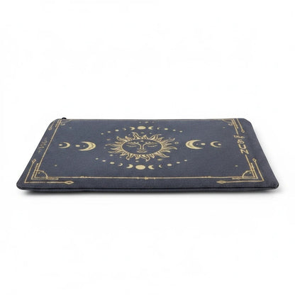 The Witches' Quest zippered canvas pouch in dark grey with a gold celestial sun and moon design.