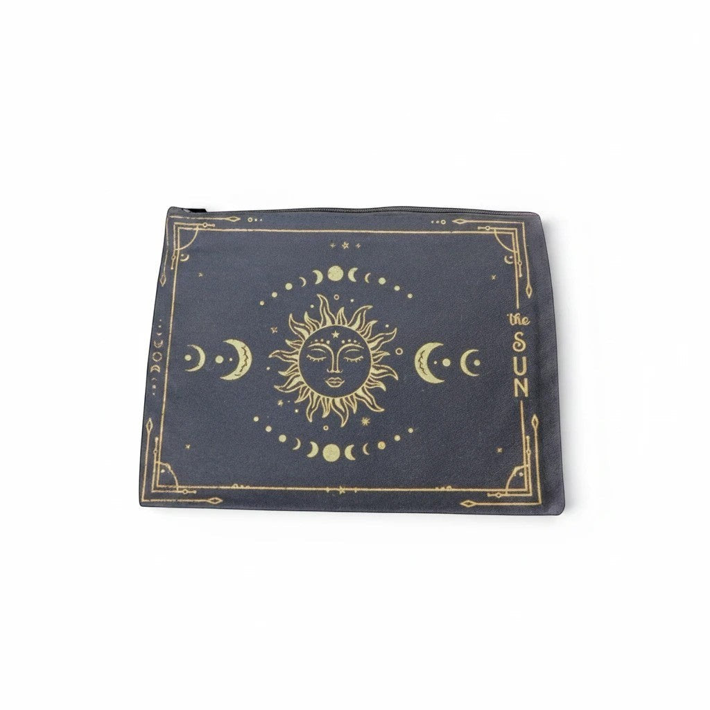 The Witches' Quest canvas zippered pouch featuring a gold celestial sun and moon design on a dark grey background.