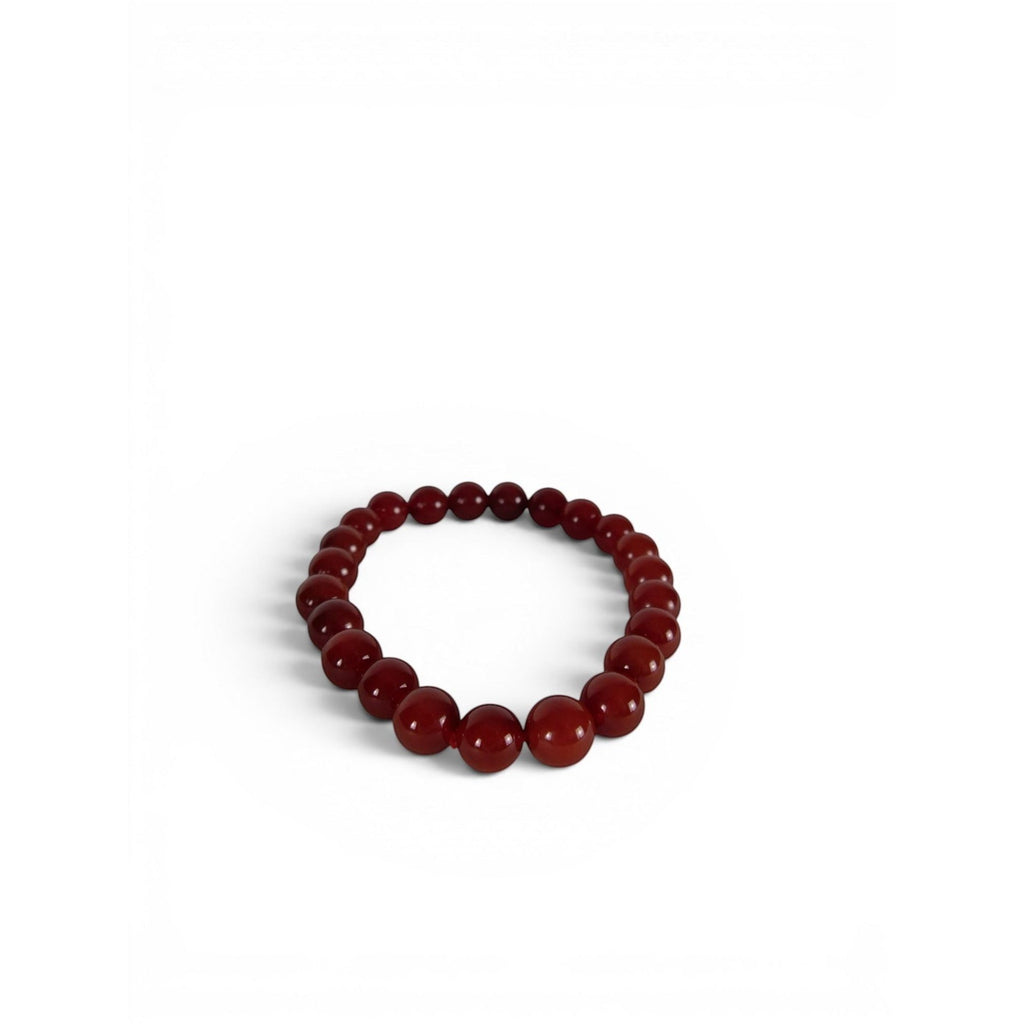 The Witches' Quest natural carnelian 8mm gemstone beaded stretch bracelet with a smooth polished finish.