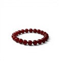 The Witches' Quest 8mm natural carnelian beaded stretch bracelet with polished red gemstone beads.