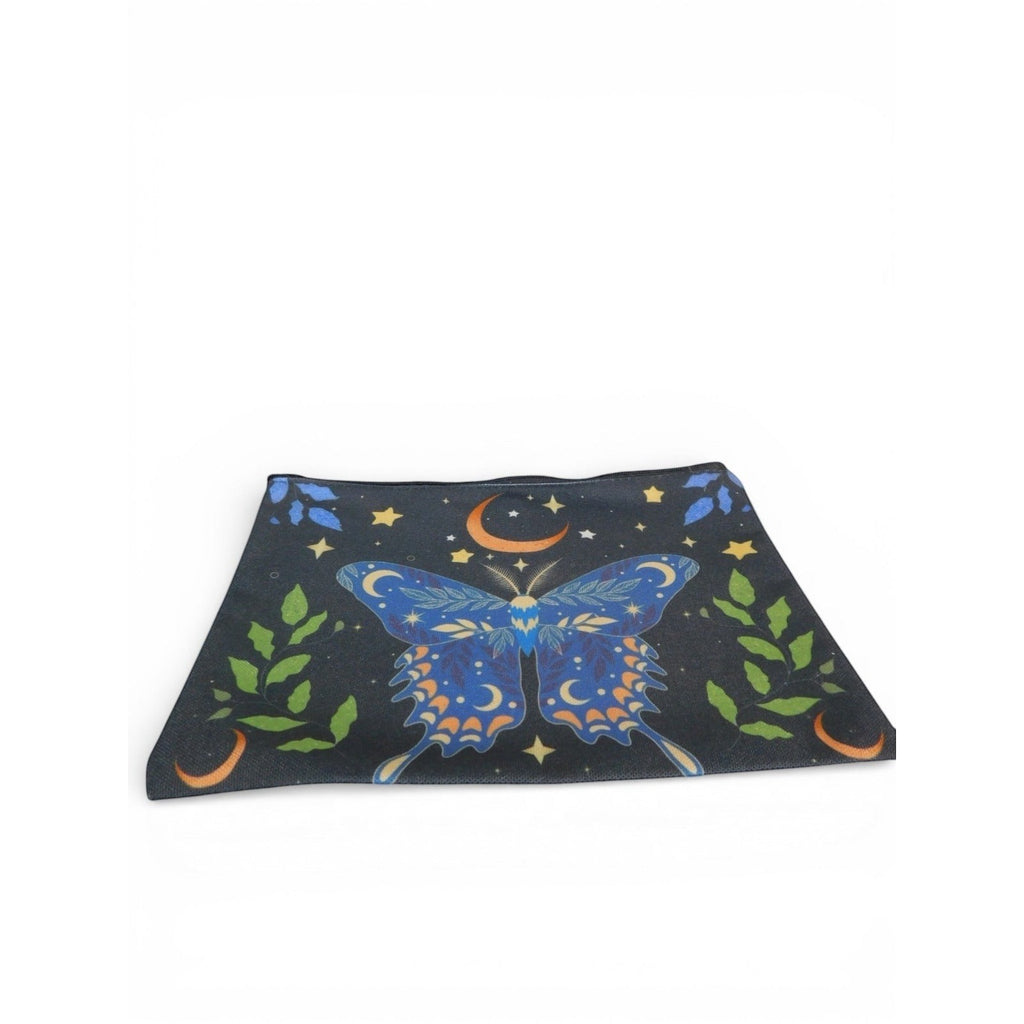 The Witches' Quest travel cosmetic bag with blue butterfly, orange moons, and yellow stars on a black fabric pouch.