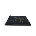 The Witches' Quest black canvas zipper pouch featuring a gold celestial sun and moon design on a white background.