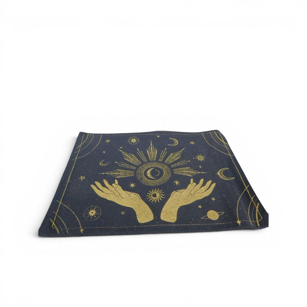 The Witches' Quest canvas zipper pouch in navy blue with a gold celestial hands and sun design.