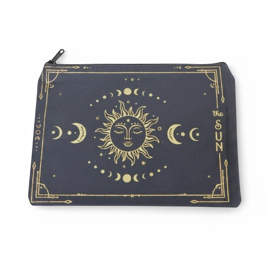The Witches' Quest canvas pouch featuring a gold celestial sun and moon design on a dark background with a zipper.