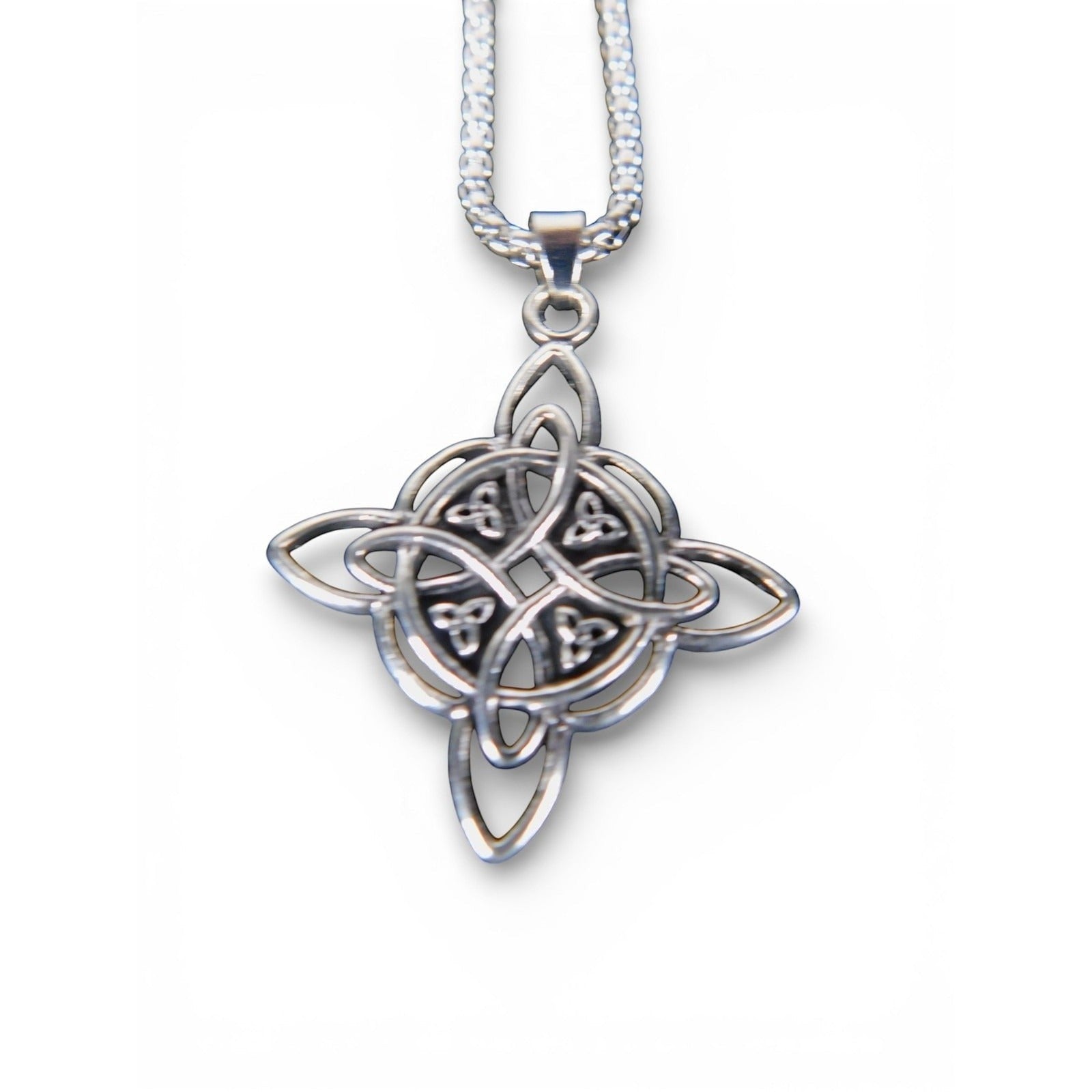 The Witches' Quest silver tone Celtic knot pendant necklace with openwork interlacing lines on a box chain.