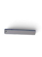 The Witches' Quest ceramic incense stick holder in midnight blue with a celestial moon phase and star design.