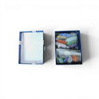 The Witches' Quest 14-piece chakra crystal set with hexagonal columns and polished stones in a blue gift box.