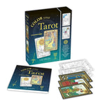 The Witches' Quest Color Your Tarot deck set with 78 black-line cards to color and a 64-page illustrated guide book.