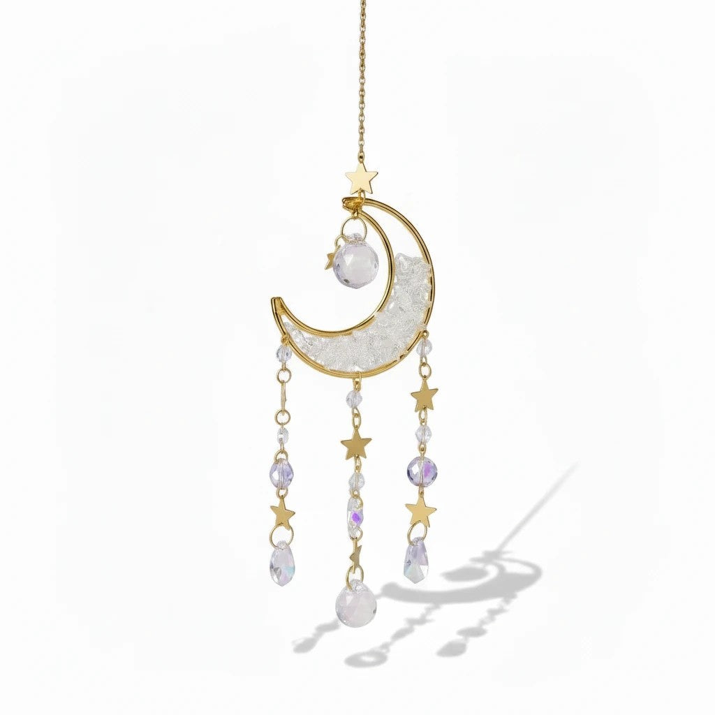 The Witches' Quest crescent moon sun catcher with gold stars, clear crystal beads, and hanging teardrop crystals.