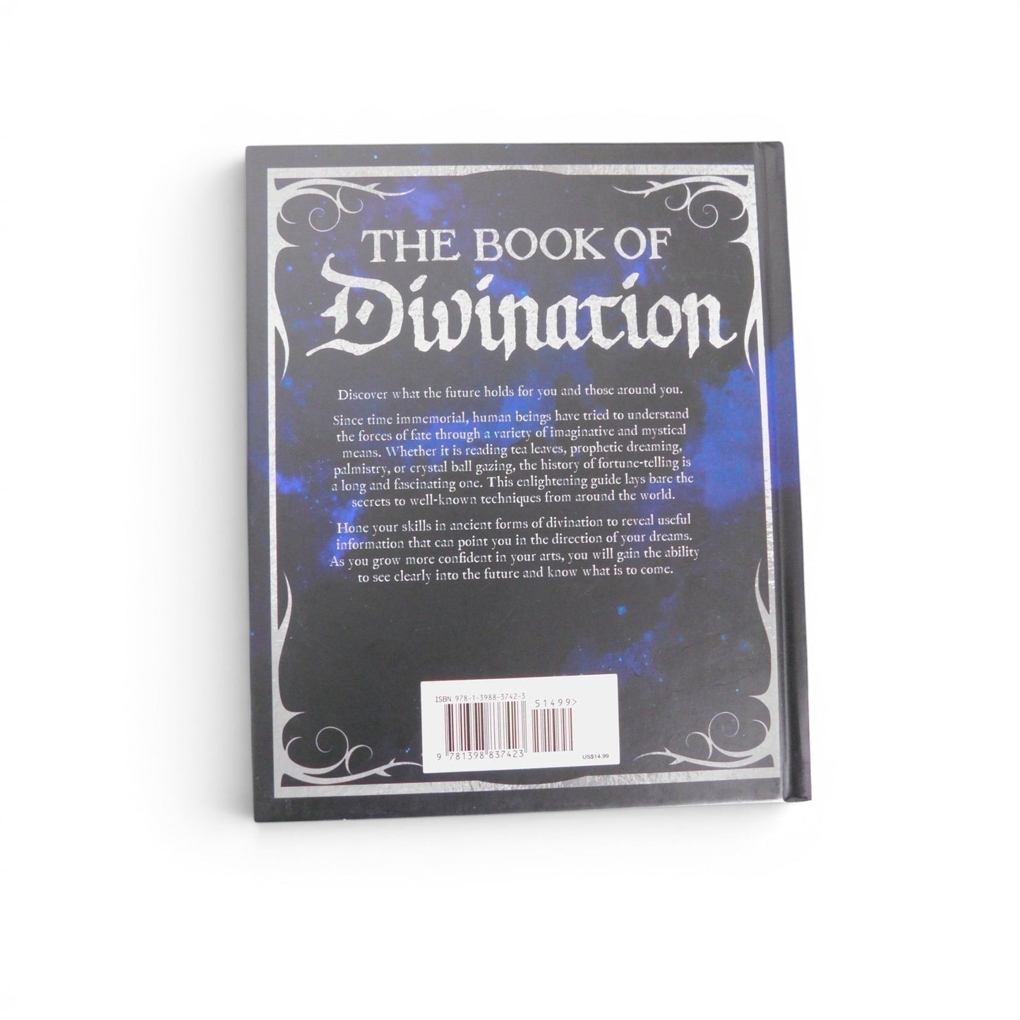 The Witches' Quest The Book of Divination hardcover guide back cover with celestial blue and black design
