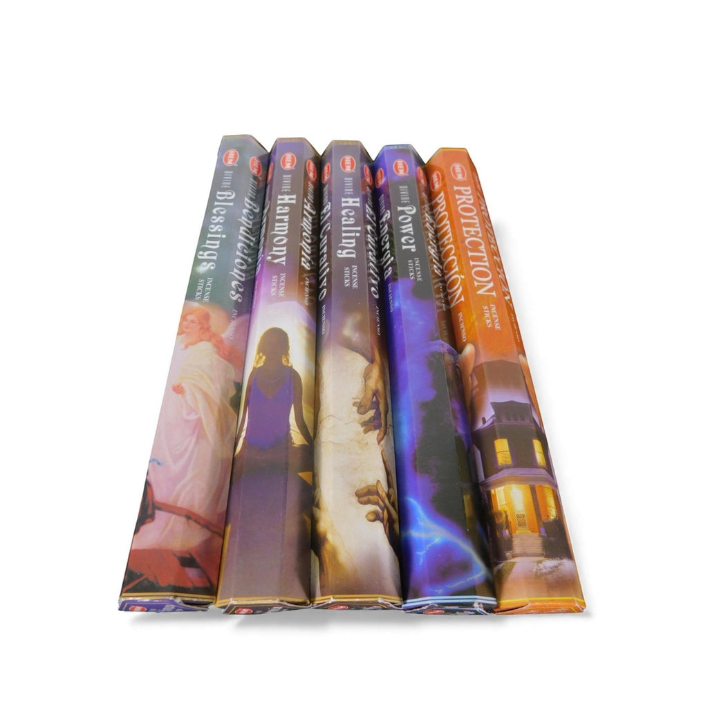 The Witches' Quest Divine Healing incense pack featuring five hexagonal tubes of sacred scents for ritual and energy work.