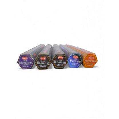 The Witches' Quest Divine Healing incense pack featuring five hexagonal tubes of sacred scents for ritual use.