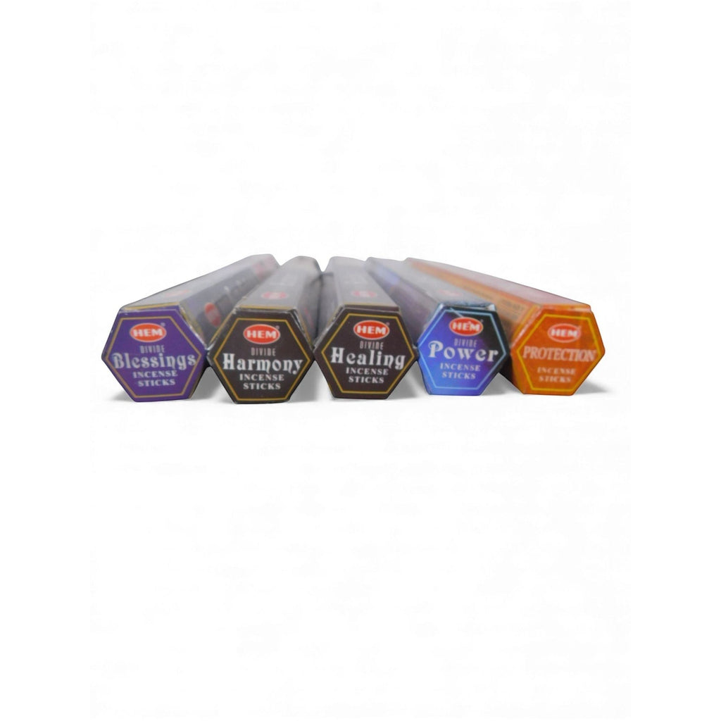 The Witches' Quest Divine Healing incense pack featuring five hexagonal tubes of sacred scents for ritual use.
