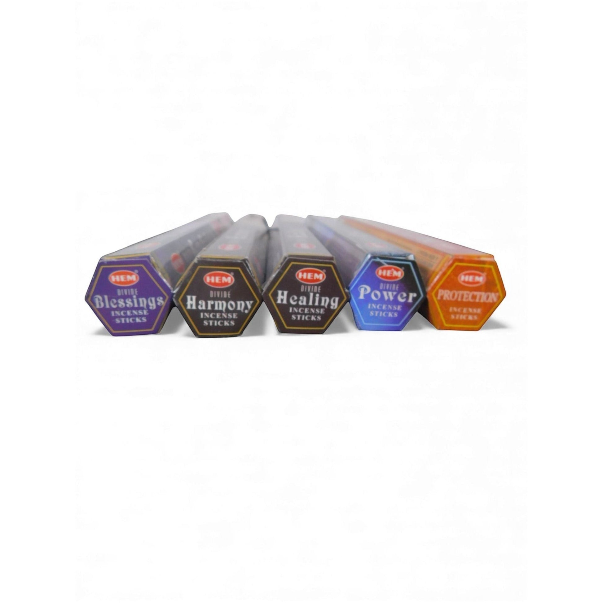 The Witches' Quest Divine Healing incense pack featuring five hexagonal tubes of sacred scents for ritual use.