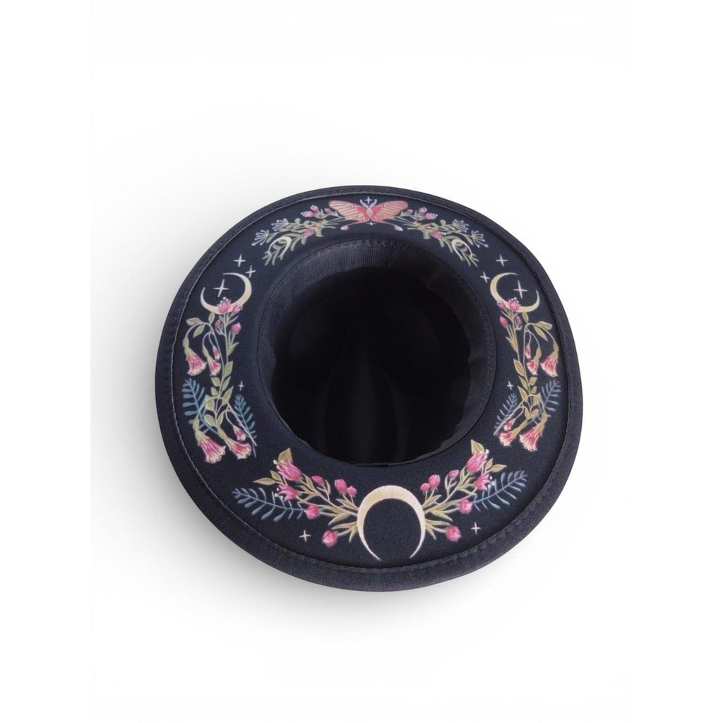 The Witches' Quest black wide brim fedora with colorful floral, moon phase, and butterfly embroidery on the brim