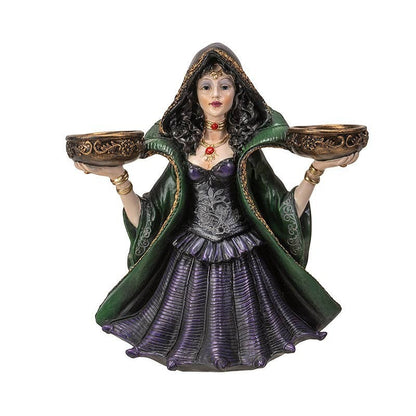 The Witches' Quest enchanted witch statue holding two ornate tea light candle bowls in a green and purple gown.