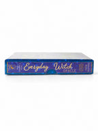 The Witches' Quest Everyday Witch Oracle deck box side view featuring blue starry design and gold lettering