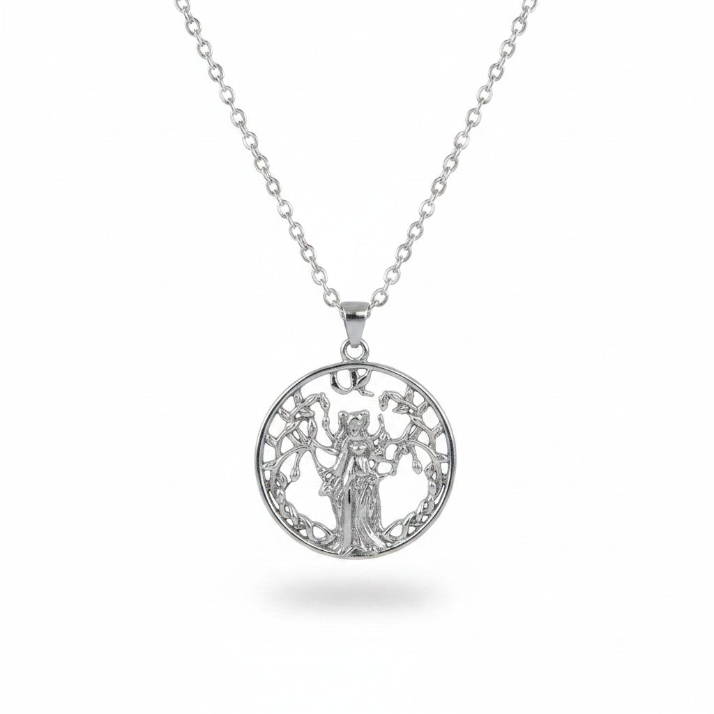 The Witches' Quest silver tone round pendant necklace featuring a goddess figure within a tree of life openwork design