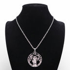 The Witches' Quest silver-tone goddess tree of life pendant necklace on a black display bust