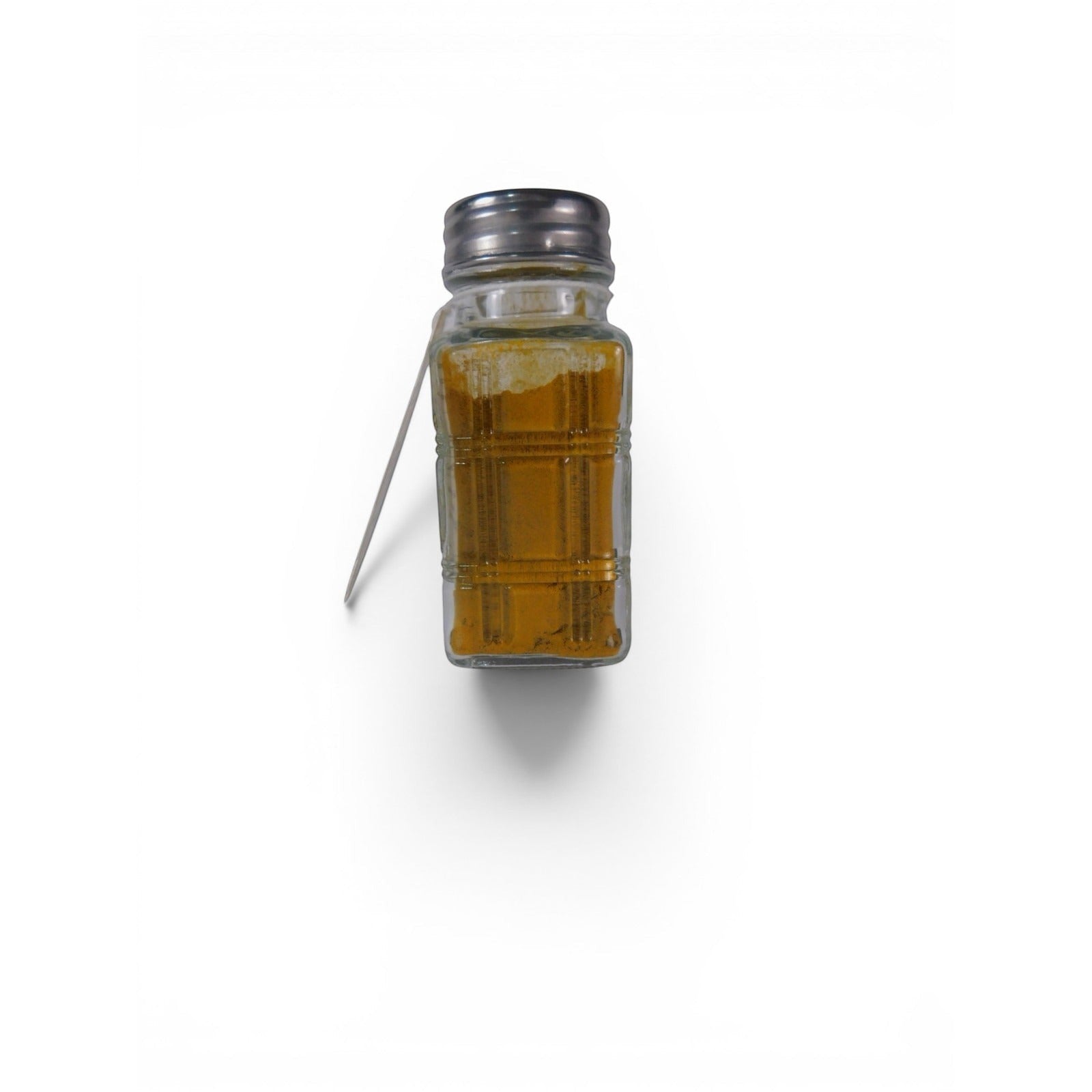 The Witches' Quest Ash & Sea Gold Dust ritual blend in a clear glass shaker bottle with a metal lid and hanging tag.