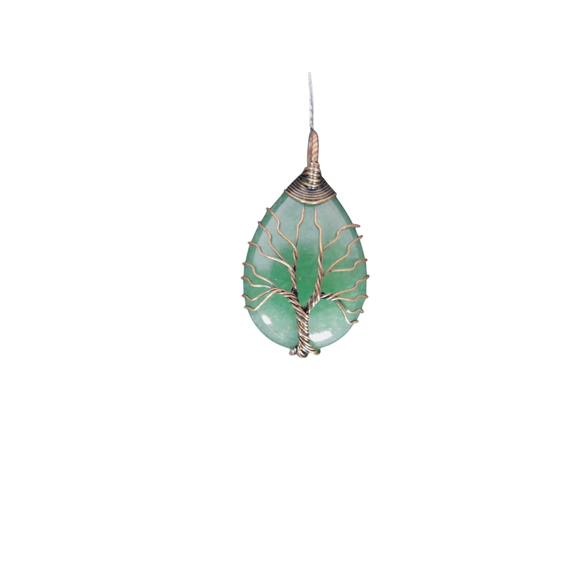 The Witches' Quest green aventurine teardrop pendant with a copper-tone wire wrapped tree of life design.