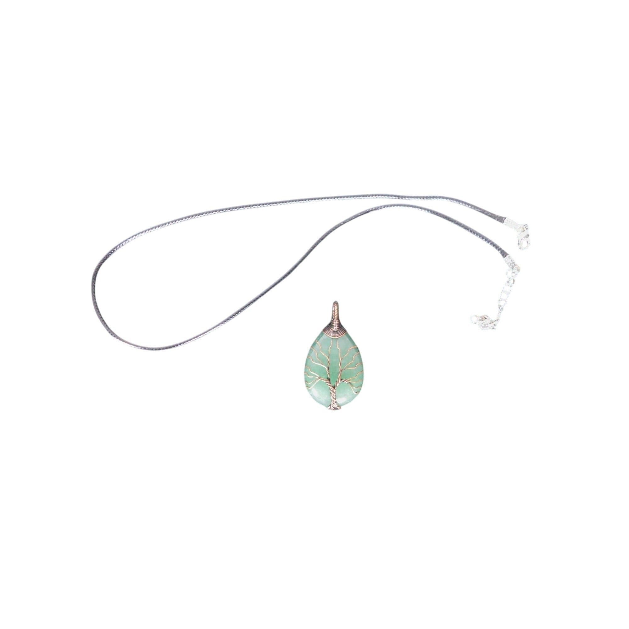 The Witches' Quest green aventurine teardrop pendant with a copper wire wrapped tree of life design on a cord necklace