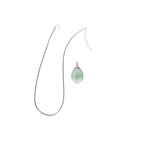 The Witches' Quest green aventurine teardrop pendant with copper wire wrapped tree of life design on a cord necklace.