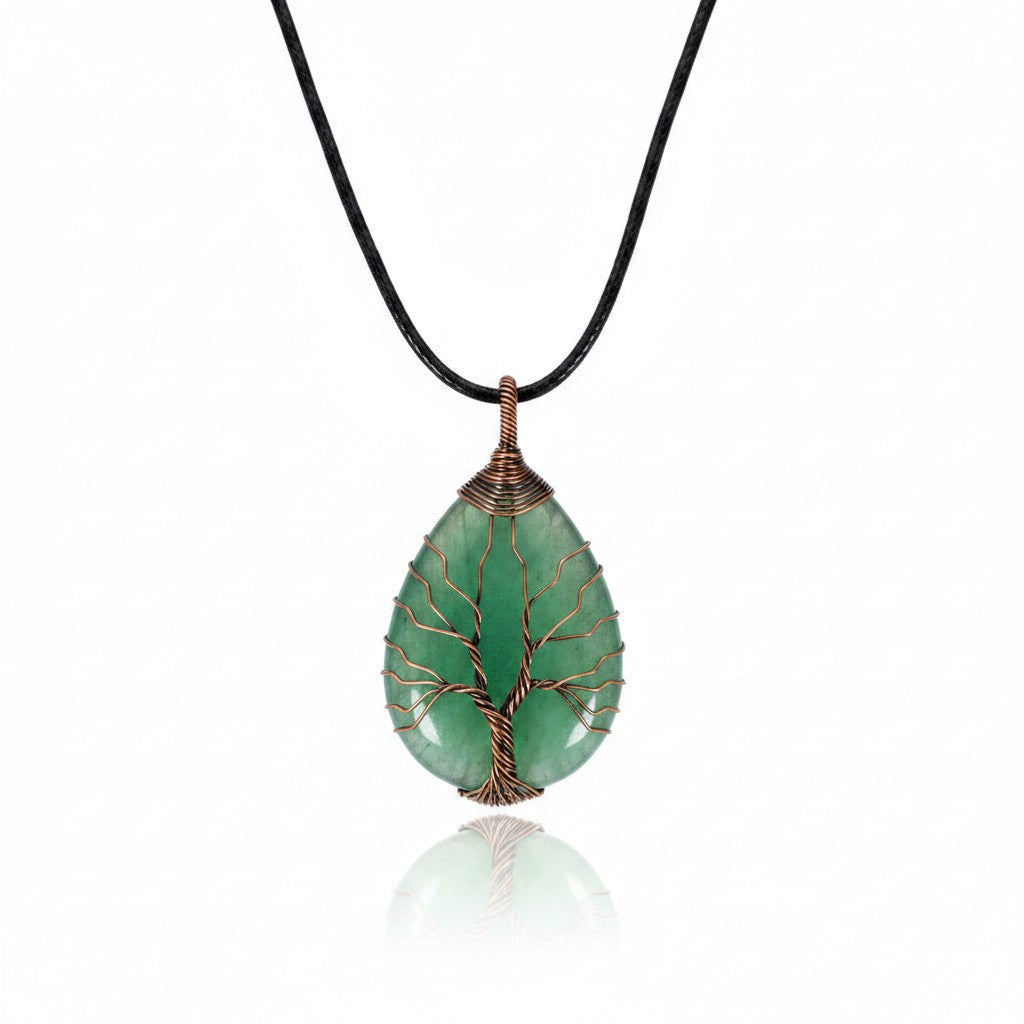 The Witches' Quest green aventurine teardrop pendant with copper wire wrapped tree of life design on a black cord.