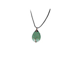 The Witches' Quest green aventurine teardrop pendant with a copper wire wrapped tree of life design on a black cord.
