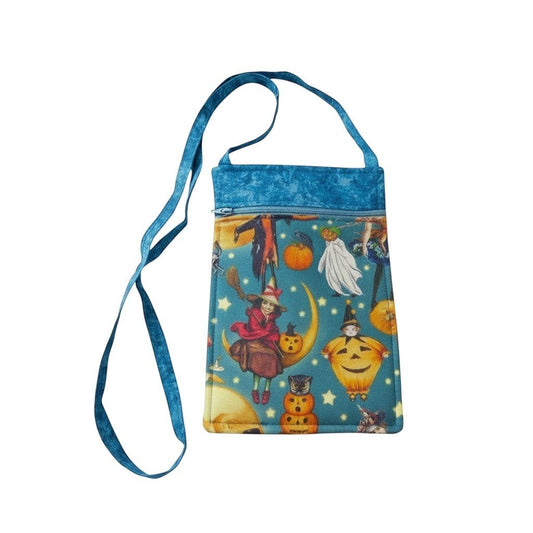 The Witches' Quest handmade Halloween crossbody bag with vintage witch and pumpkin print and blue adjustable strap.