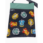 The Witches' Quest handcrafted Harry Potter crossbody bag with black fabric featuring colorful Hogwarts house crests.