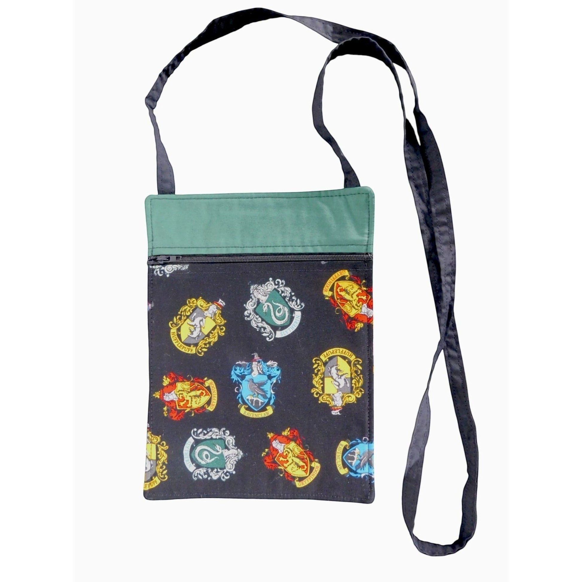 The Witches' Quest handcrafted Harry Potter crossbody bag with vibrant Hogwarts house crests and green trim.