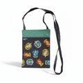 The Witches' Quest handcrafted Harry Potter crossbody bag with vibrant house crests and a green top trim.