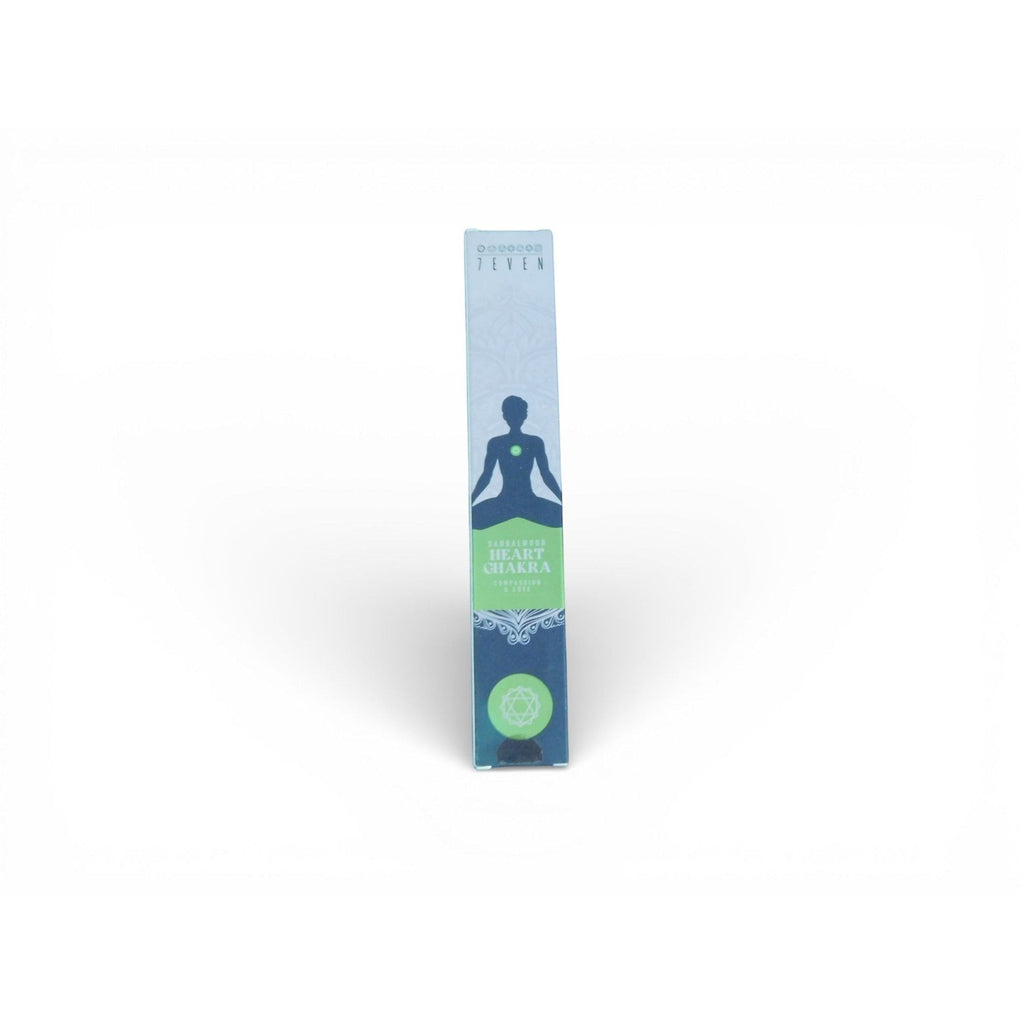 The Witches' Quest Heart Chakra sandalwood incense box with meditation silhouette design on a light green background.