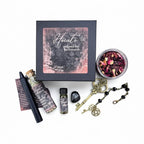 The Witches' Quest Hecate Enchanted Key DIY kit featuring a skeleton key, black candle, herbs, oil, and onyx stone.