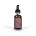 The Witches' Quest Hecate sacred ritual oil in a glass dropper bottle with visible herbs, 1 fl oz size.