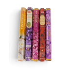 The Witches' Quest HEM floral incense variety pack featuring five hexagonal boxes of gardenia, lavender, lilac, rose, and violet scents.