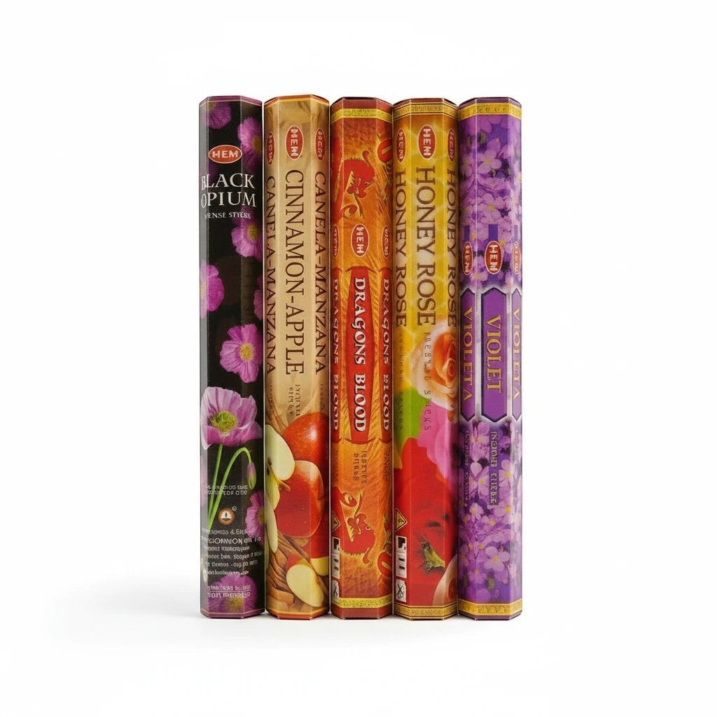The Witches' Quest HEM incense variety pack featuring five hexagonal boxes with floral and spice scent themes.