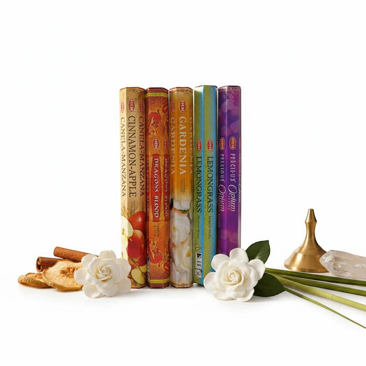 The Witches' Quest HEM incense variety pack featuring five hexagonal scent boxes with cinnamon, floral, and herbal notes.