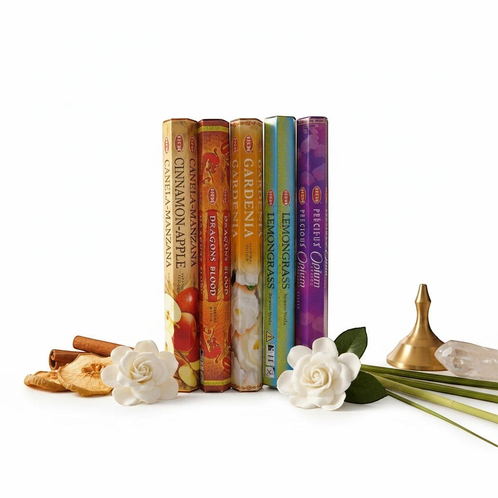The Witches' Quest HEM incense variety pack featuring five scent boxes with dried apple, gardenia flowers, and crystal.