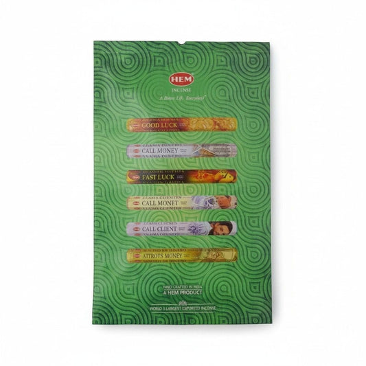 The Witches' Quest HEM Money Series incense stick collection in green packaging featuring prosperity-themed scents.